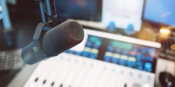 Warner Music settles copyright lawsuit with Udio, signs deal for AI music platform